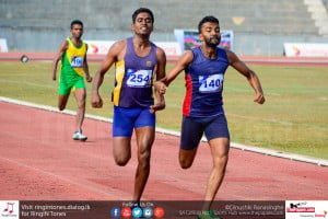 Pradeep Sanjaya and C.L.I Weerasinghe at the edge of the white line in the 400m event