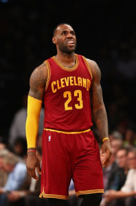 NEW YORK, NY - JANUARY 20: LeBron James #23 of the Cleveland Cavaliers looks on against the Cleveland Cavaliers during their game at the Barclays Center on January 20, 2016 in New York City. NOTE TO USER: User expressly acknowledges and agrees that, by downloading and/or using this Photograph, user is consenting to the terms and conditions of the Getty Images License Agreement. Al Bello/Getty Images/AFP