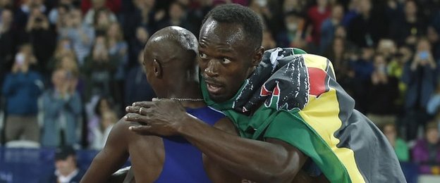 Bolt and Farah shared an embrace before the Briton's 3,000m victory