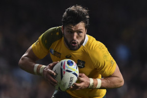 Australia's wing Adam Ashley-Cooper runs to score his third and his team's fourth try during a semi-final match of the 2015 Rugby World Cup. (AFP)