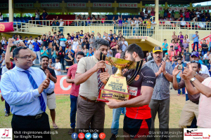 University of Peradeniya rugby captain Udara Kasthuriarachchi receiving the winning trophy