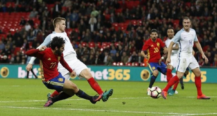 Spain's Isco scores their second goal