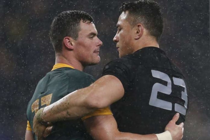 Jesse Kriel of South Africa (left) is comforted by Sonny Bill Williams of New Zealand after the All Blacks fought back to win their Rugby World Cup semi-final in London on Oct 24. PHOTO: REUTERS